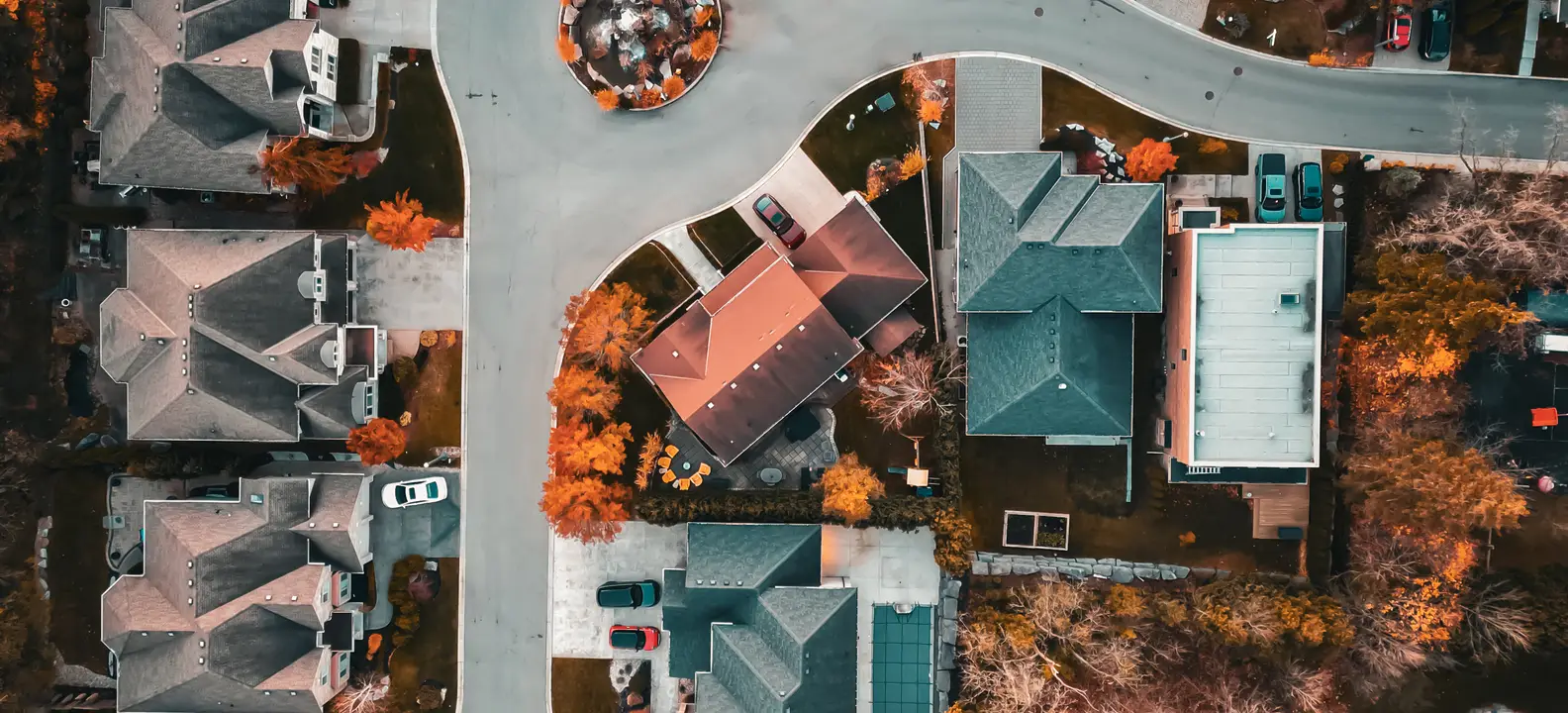 Looking straight down on a cul-de-sac of homes in Highland, London, Ontario, with fall colour in the yards