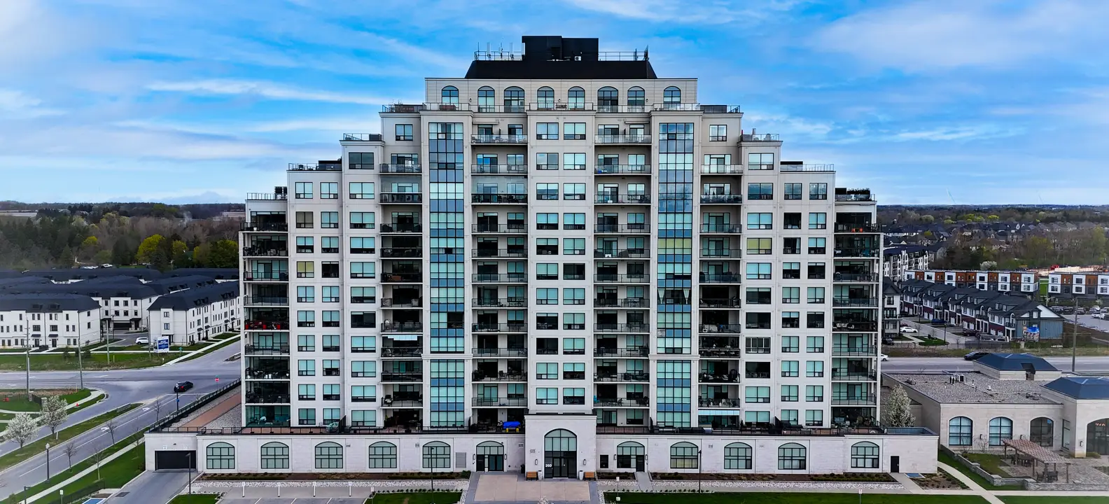 A mid-rise condo building in Sunningdale, London, Ontario, photographed by drone when Justin listed a unit there